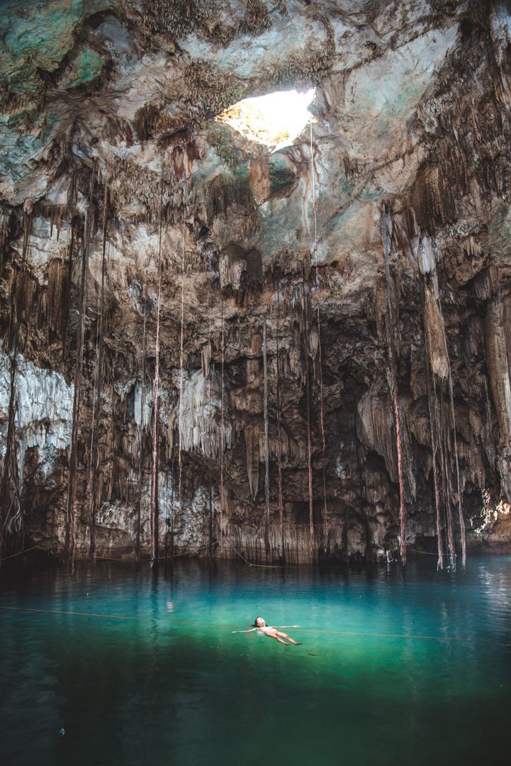 Floating in a cave cenote.