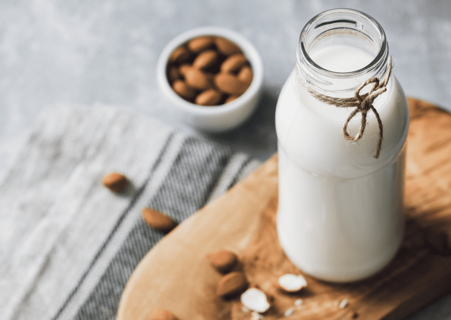 almond milk on wooden table