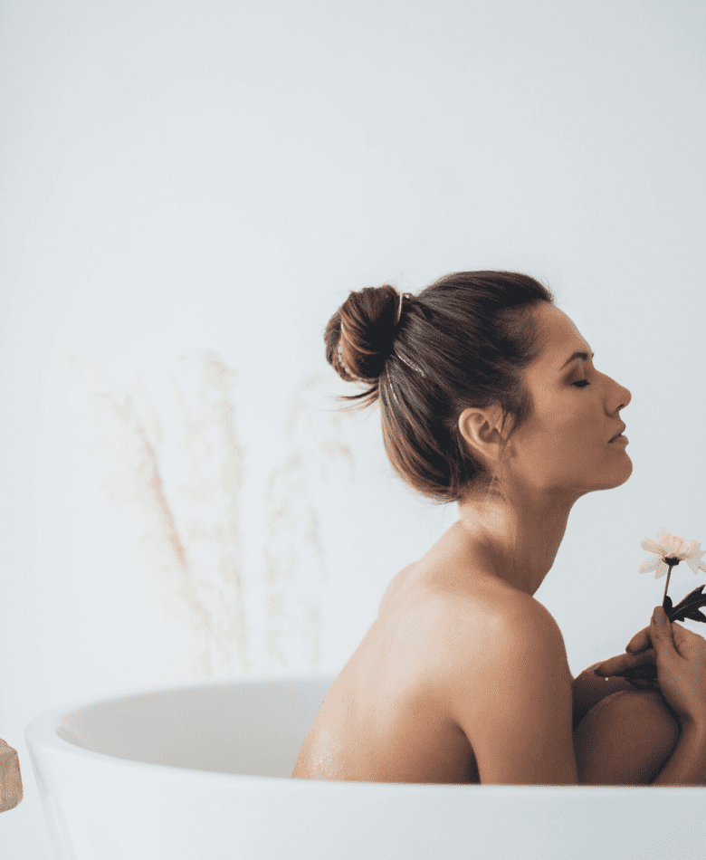 Winter self care rituals woman in bath