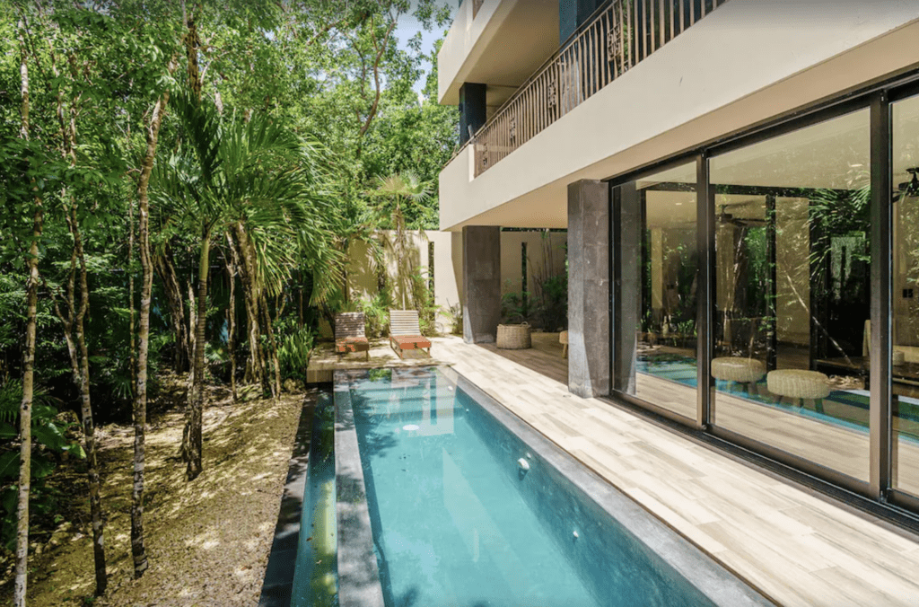 Pool and outdoor patio in a luxury villa Tulum
