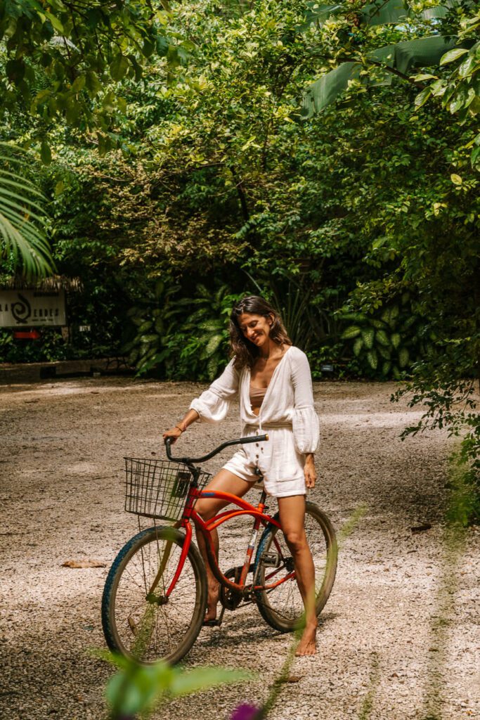girl on a red bike