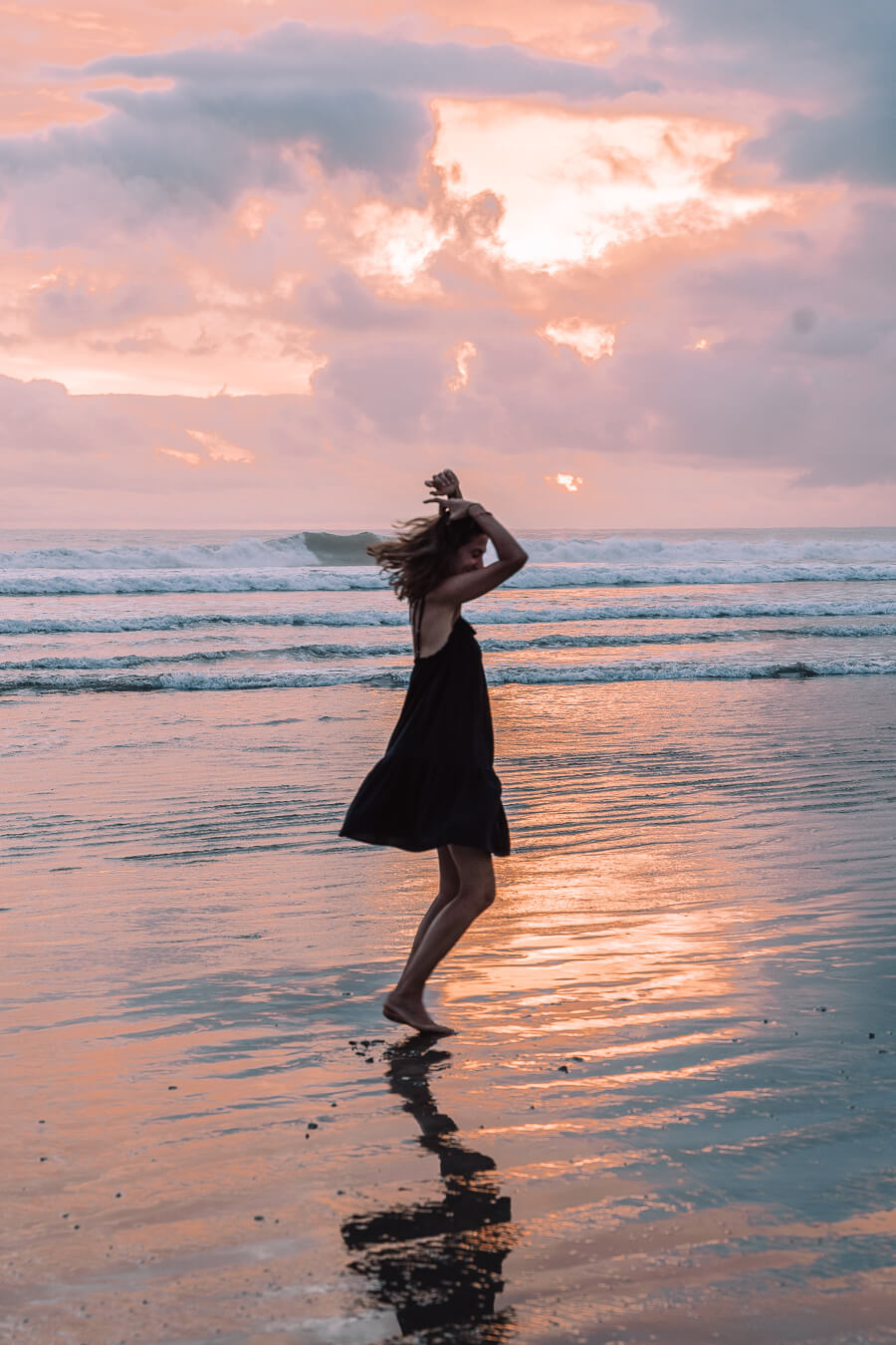 woman dancing in the sunset