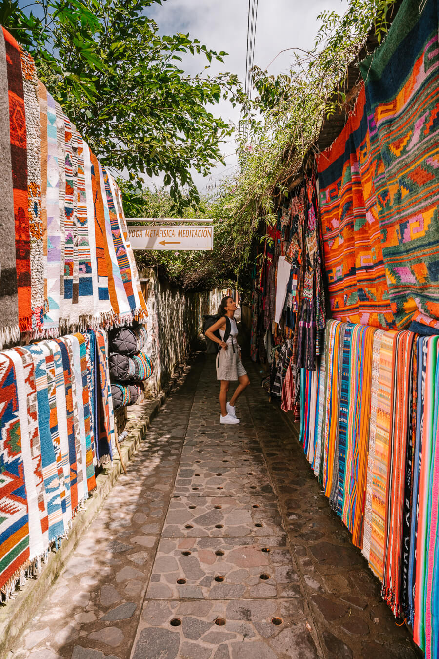 woman shopping for textiles in Guatemala