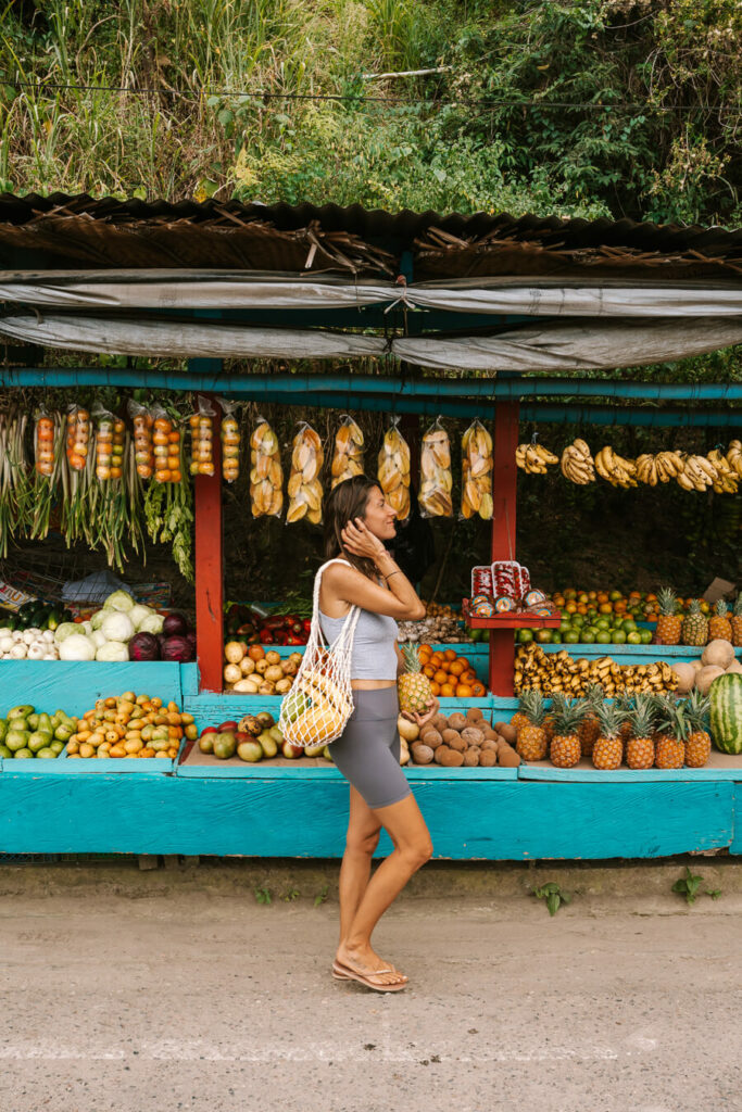 woman at a fruit market, Colombia
