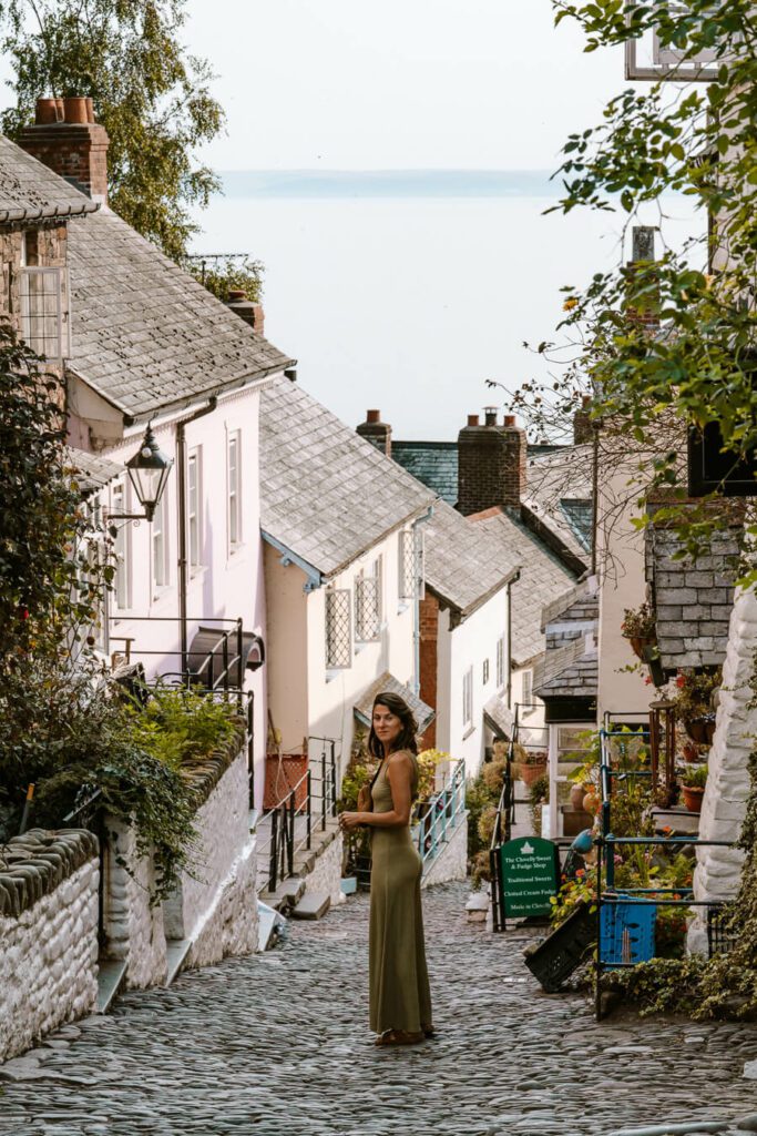 woman in the main street of Clovelly Devon