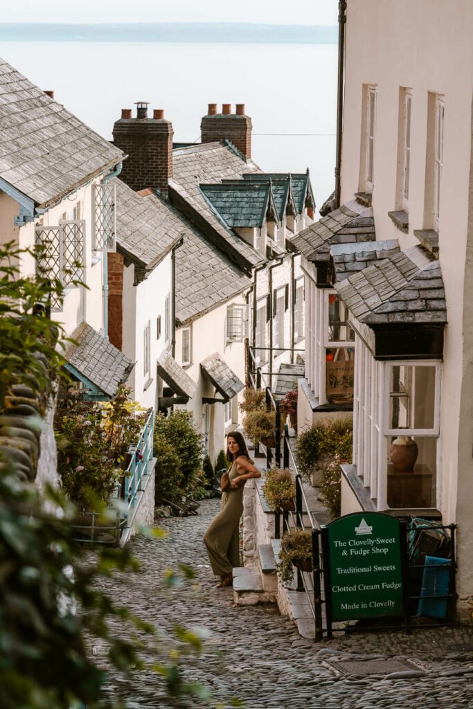 woman on the main street of Clovelly Devon