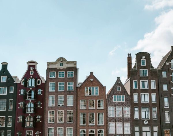 tops of houses on the Damrak waterfront, Amsterdam