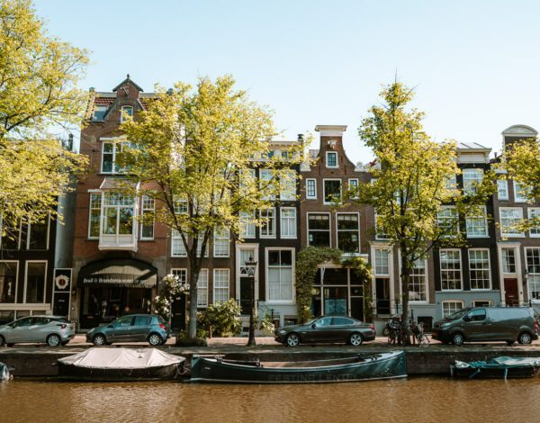 historical buildings along a canal in Amsterdam Netherlands