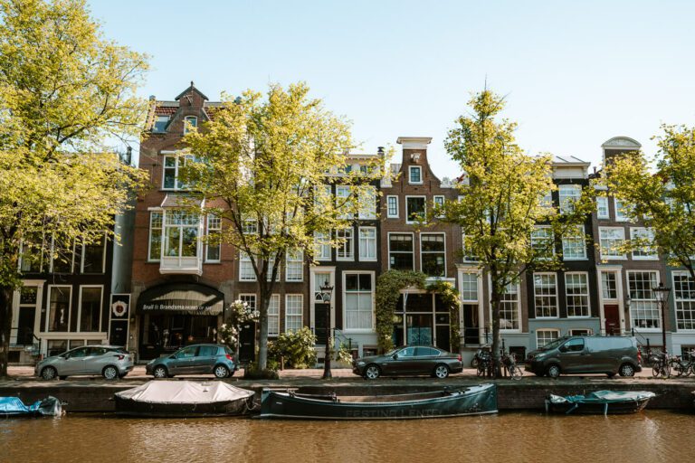 historical buildings along a canal in Amsterdam Netherlands