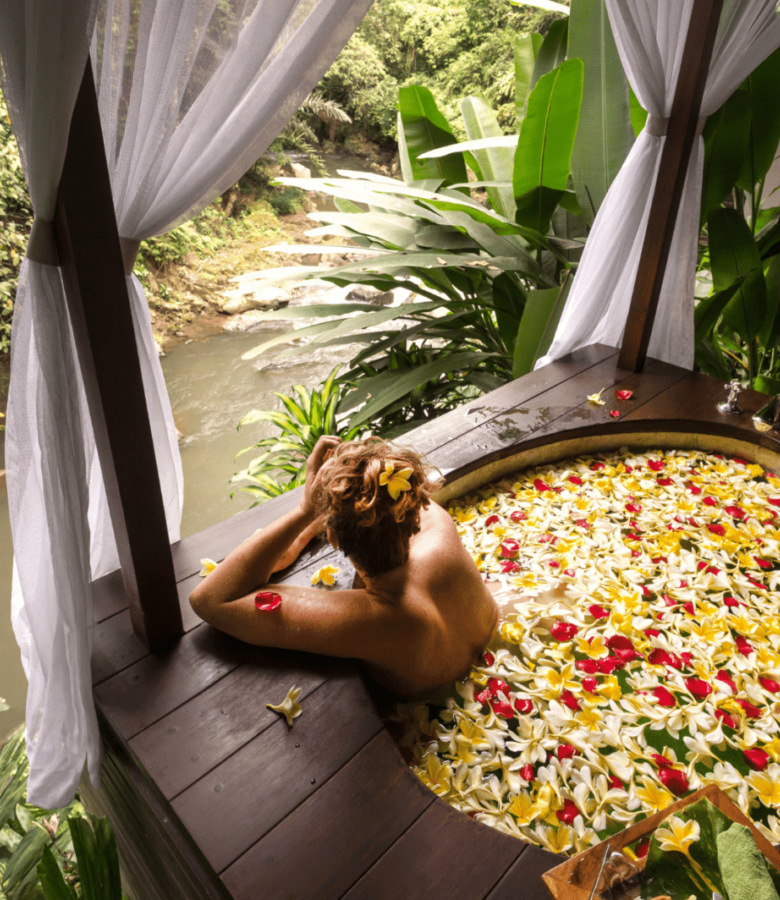 woman in a flower bath in Bali