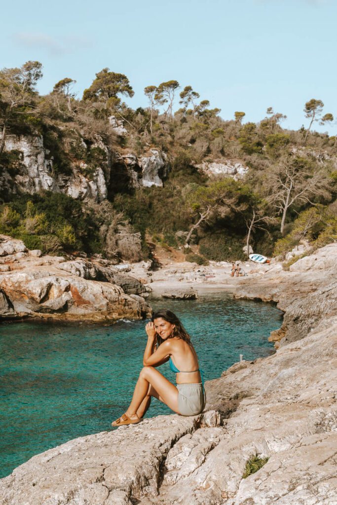 woman in a pretty cove in Mallorca 