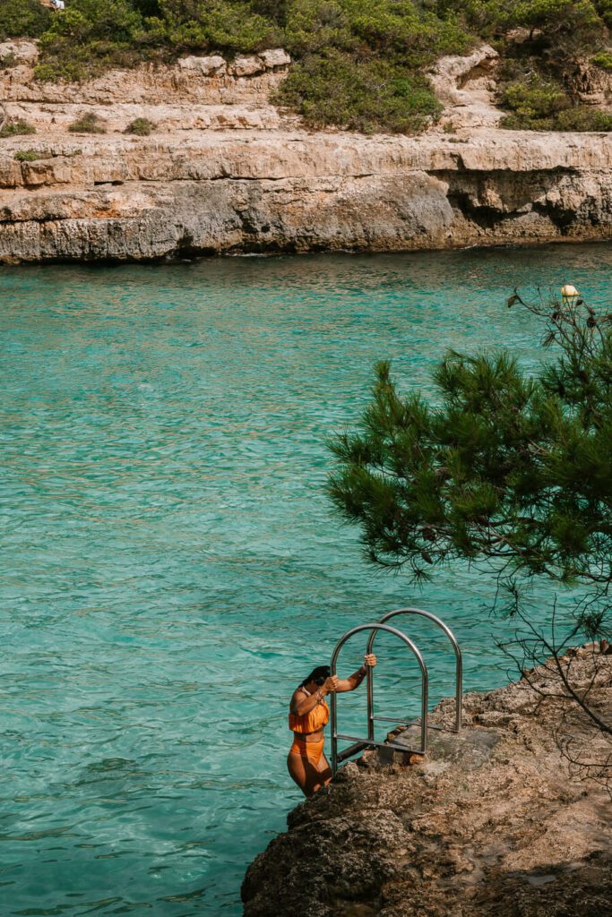 woman getting out of the water, Mallorca Spain