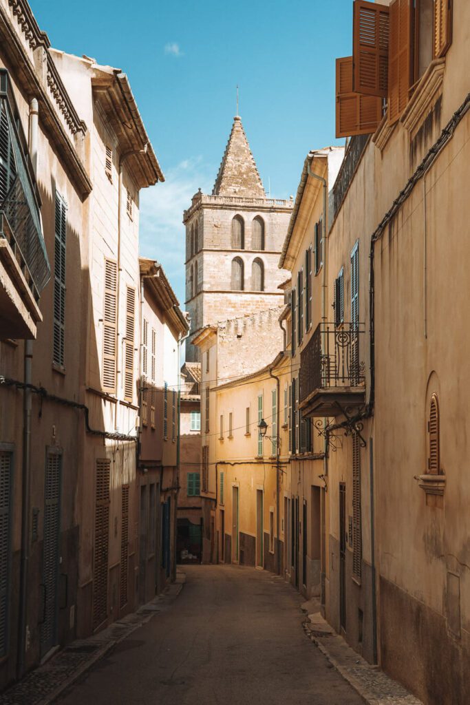 street with church spire in Sineu Mallorca