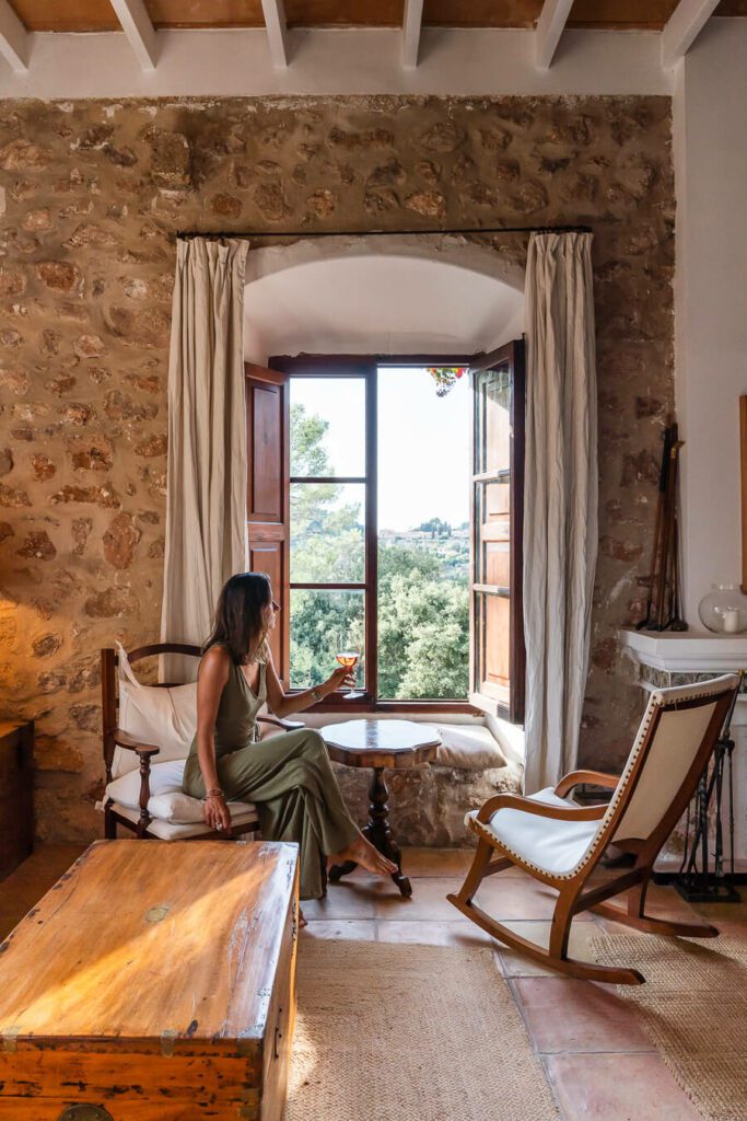 best luxury hotels in Mallorca woman in living room. 