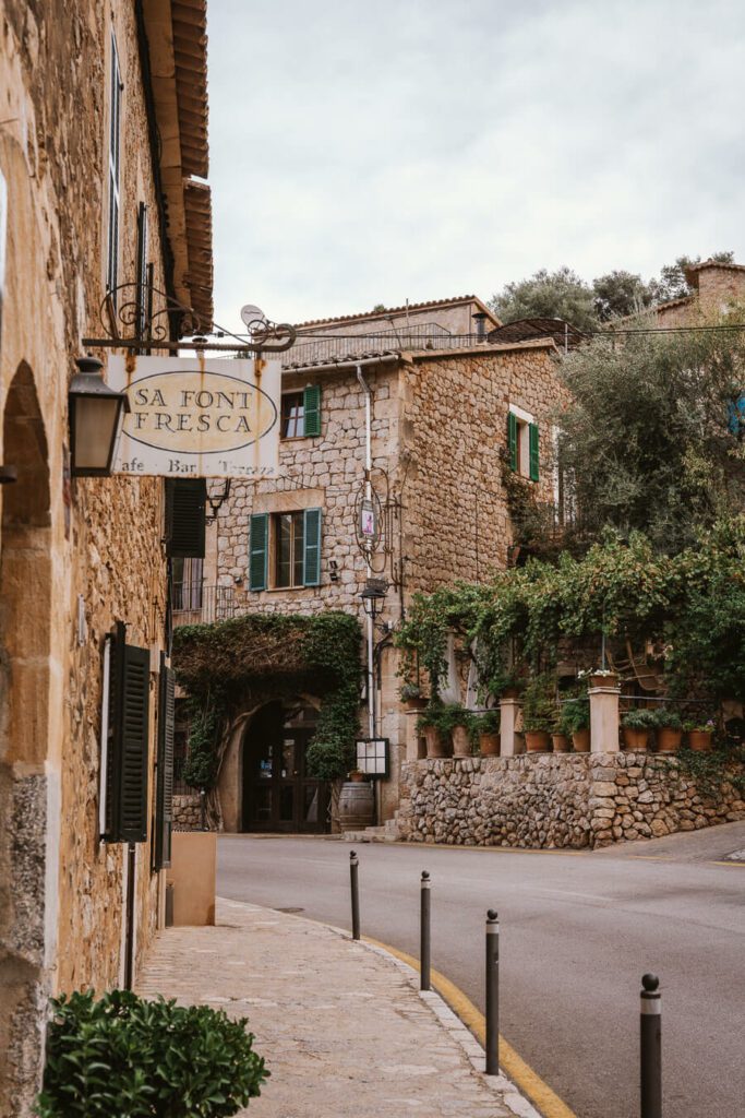 stone building and sign in Mallorca