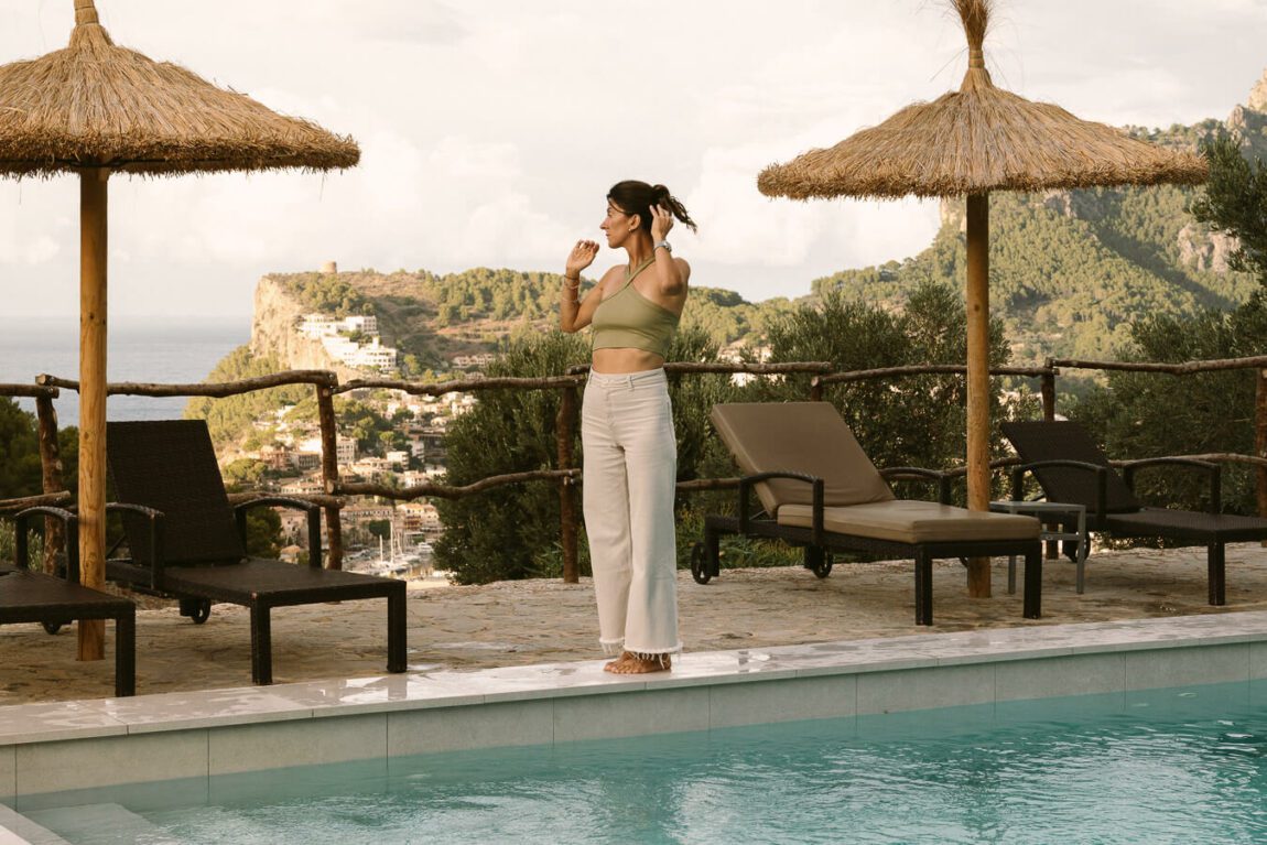 woman by the pool on mallorca yoga retreat