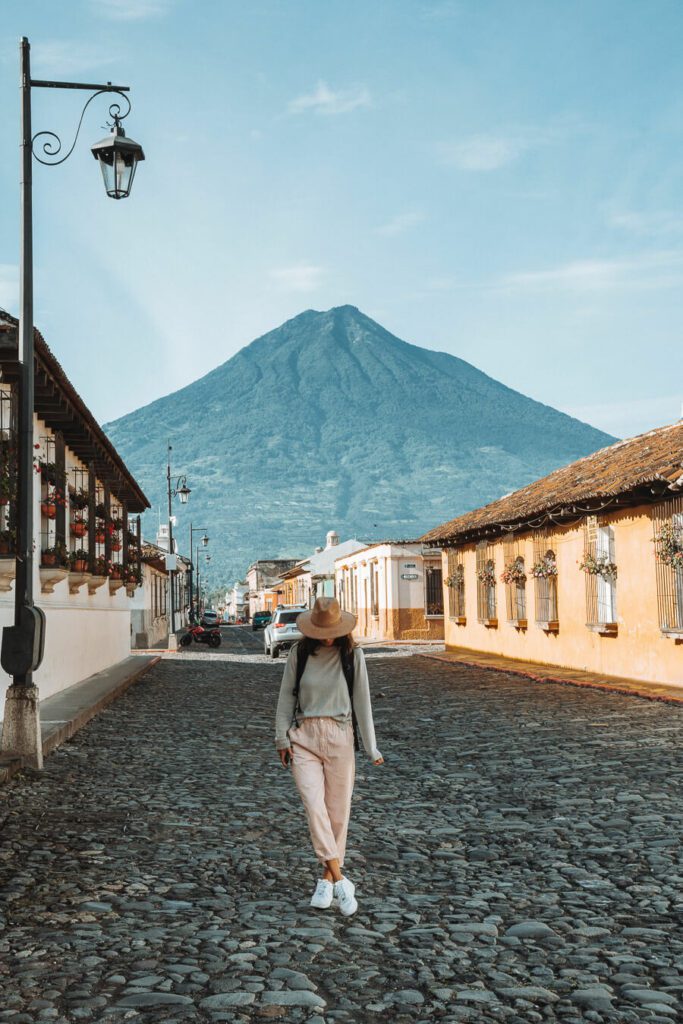 womon and a pretty street in Antigua Guatemala