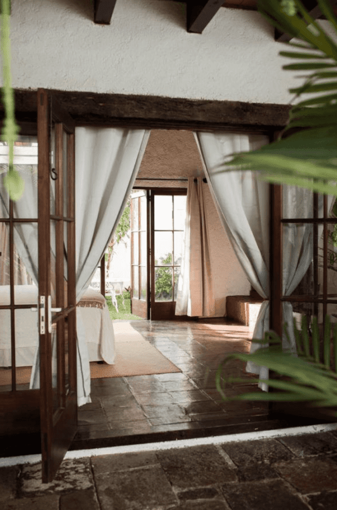 a luxury hotel room in antigua Guatemala at Cacap Boutique HOtel