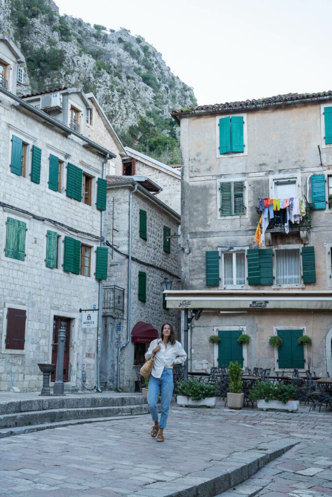 woman exploring the Old Town of Kotor, one of the things to do in Kotor