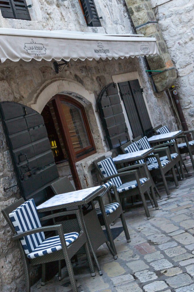Tables and chair outside a cafe in Kotor, Montenegro
