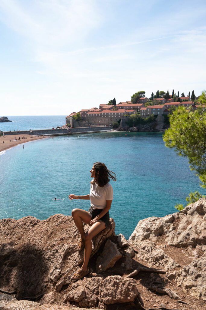 woman with a view of Sveti Stefan Montenegro