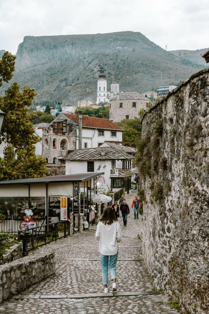 woman walking through the old town in Mostar, Bosnia