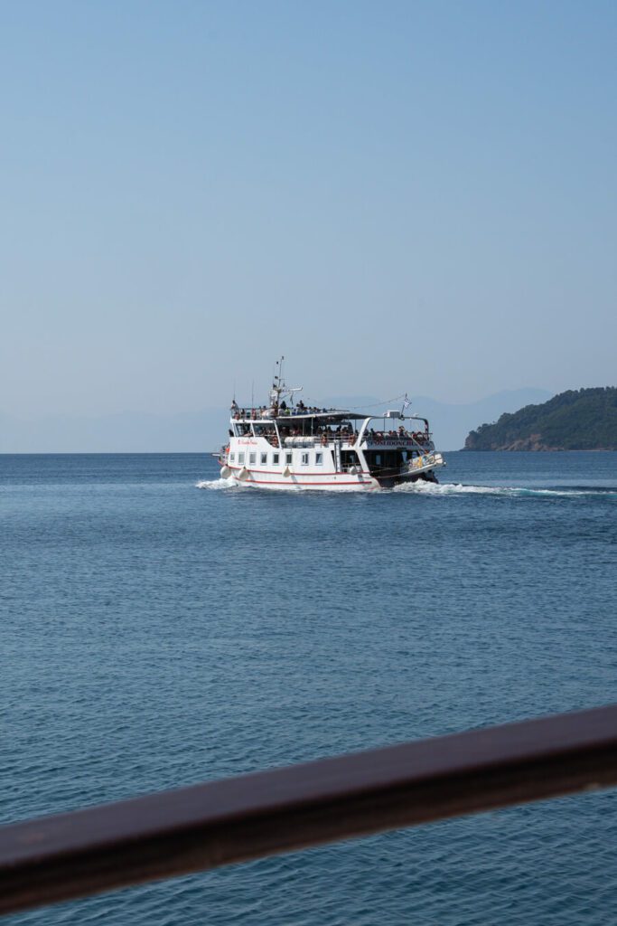 boat leaving Skiathos port