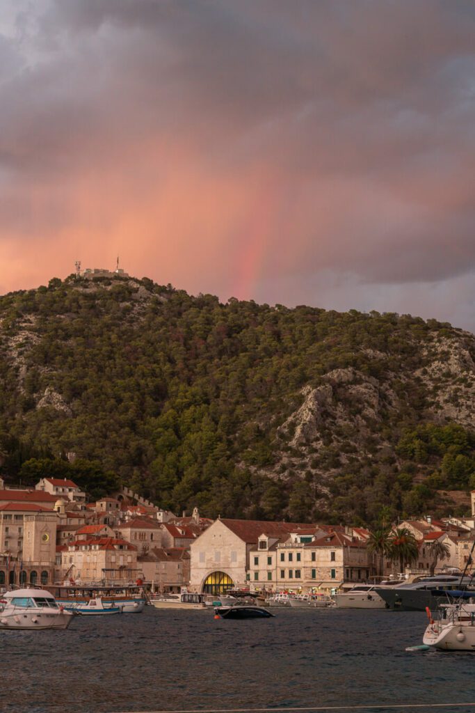 rainbow and pink skies over Hvar island Croatia