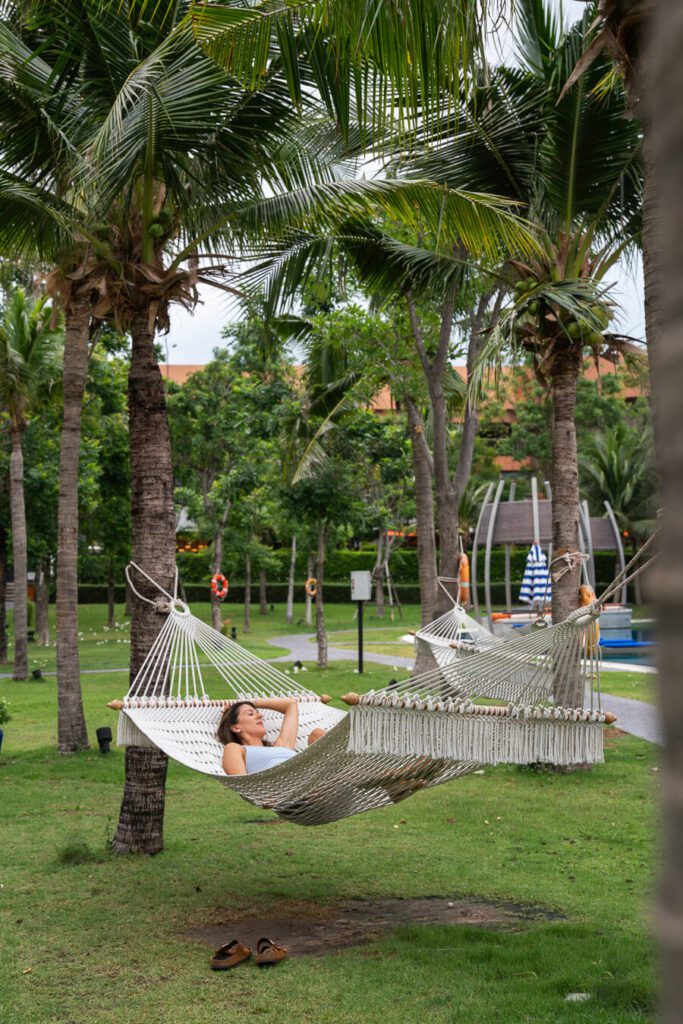 woman in hammock at best Hua Hin beach hotels and resorts Thailand