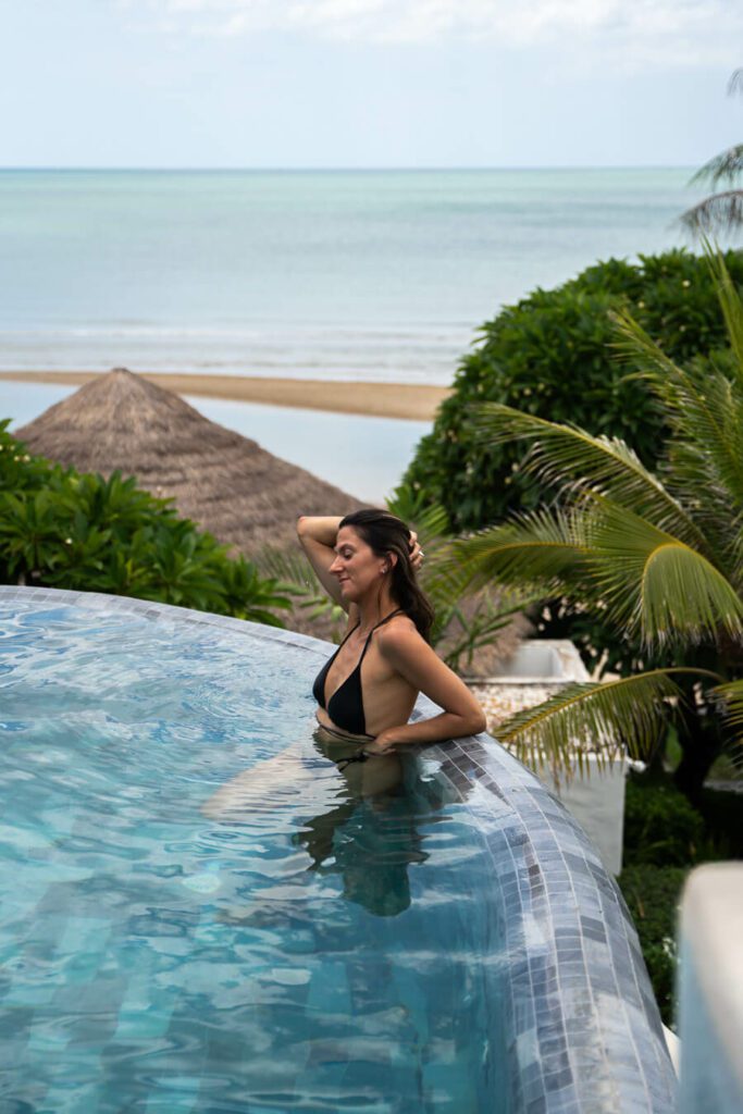 woman in the pool at Aleenta Resort & Spa, Pran Buri best Hua Hin beach hotels