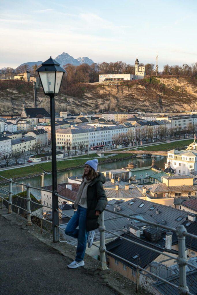 woman at a viewpoint in Salzburg in winter