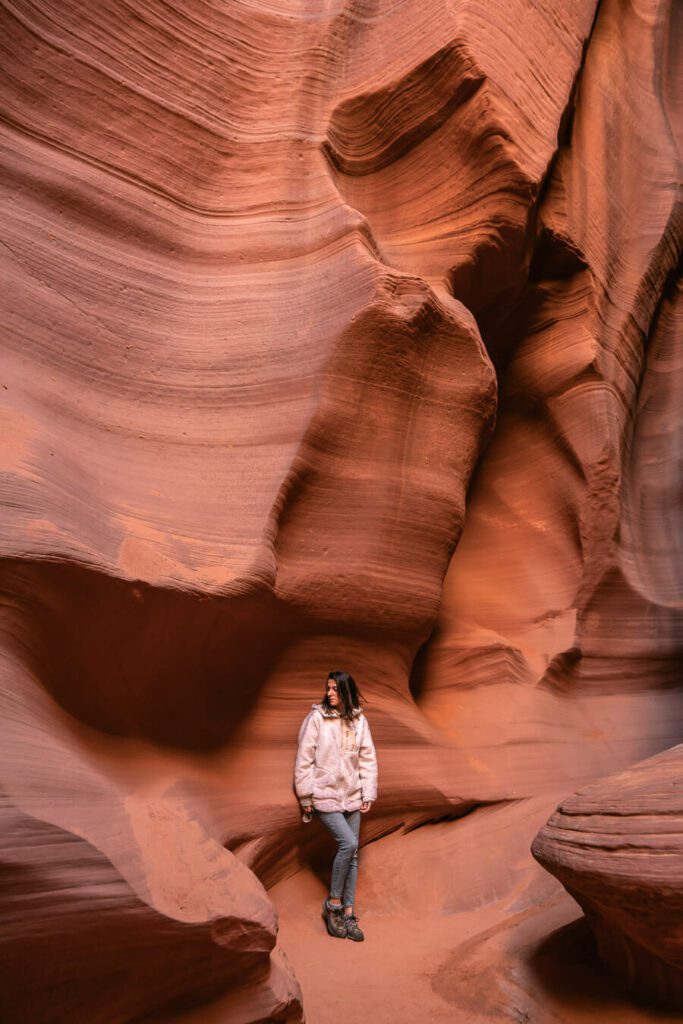 woman visiting Antelope Canyon at the best time