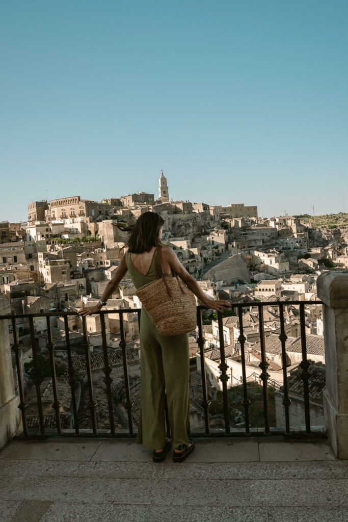 woman at a viewpoint in matera italy