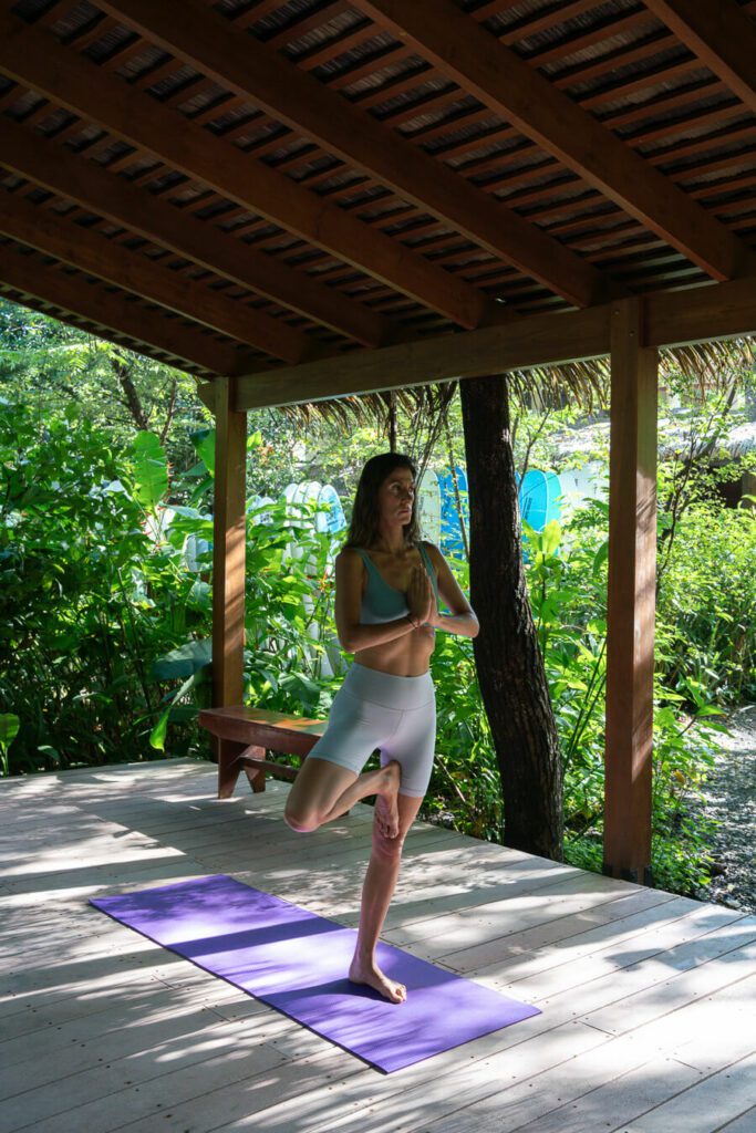 woman doing yoga at a hotel in Nosara Costa Rica