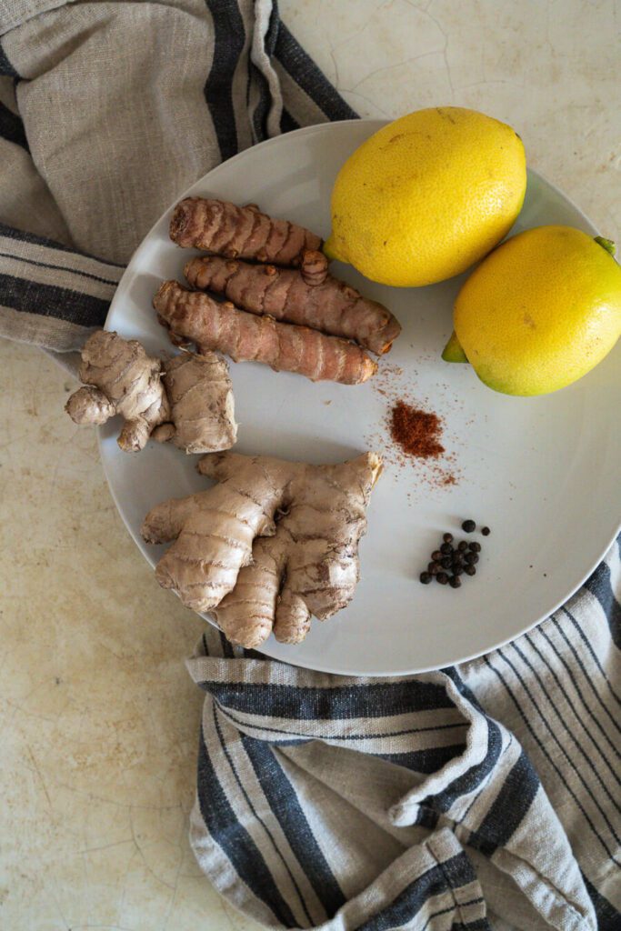 plate with lemon, turmeric and ginger