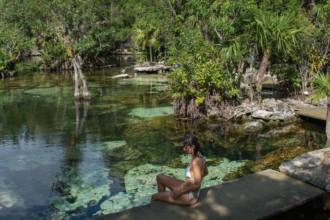 woman at cenote azul playa del carmen mexico