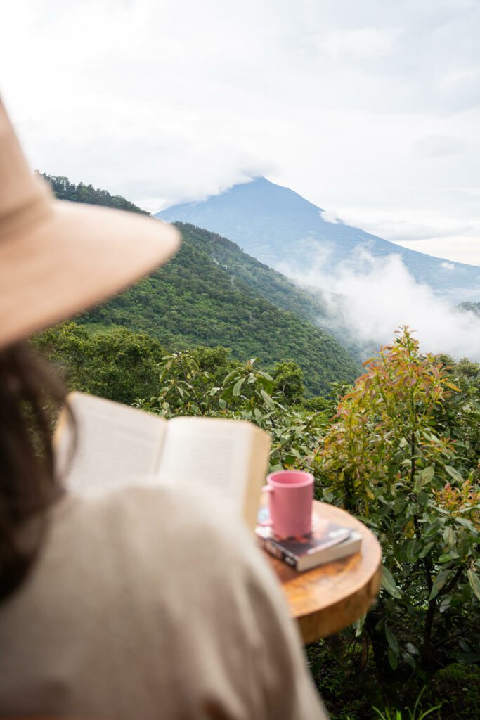 reading and relaxing on a yoga retreat in guatemala