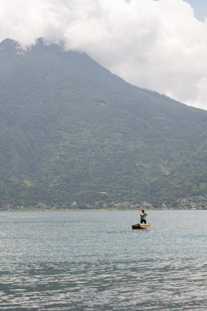 Lake Atitlan fisherman with volcano