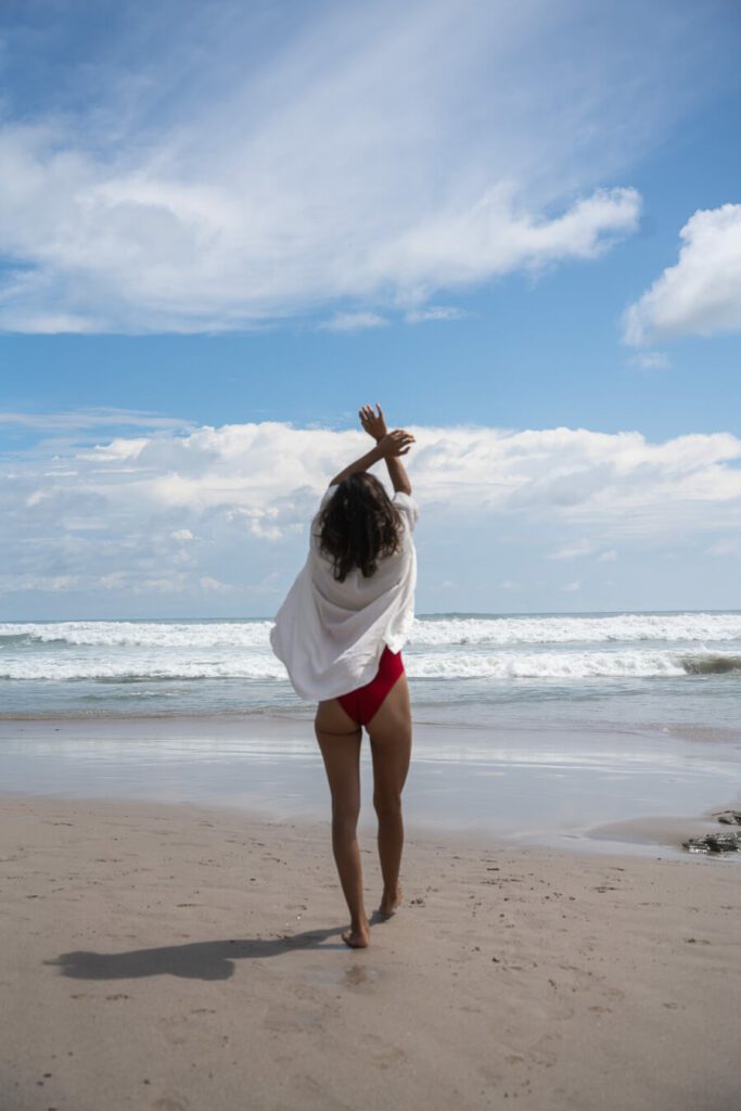woman on the beach in santa teresa costa rica