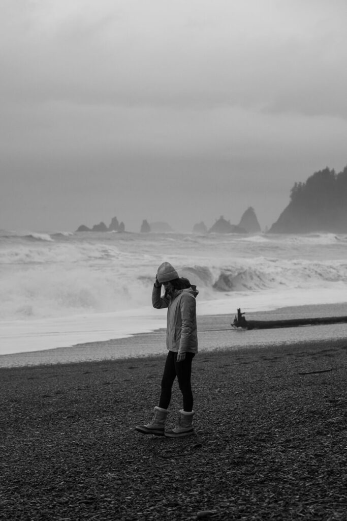 woman on Rialto Beach, Washington,