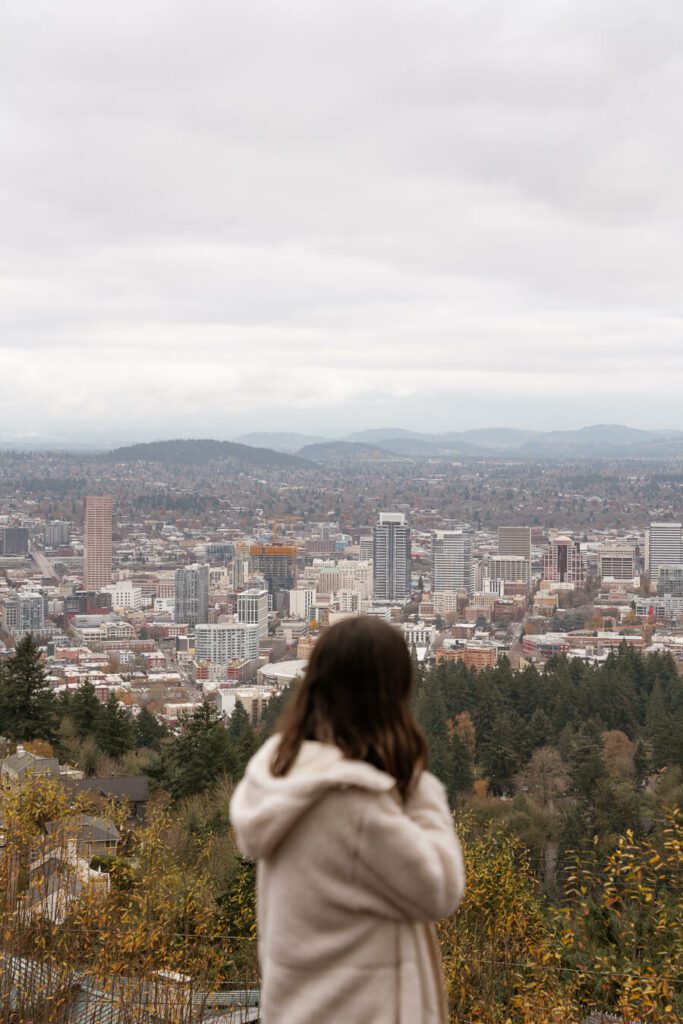 woman and portland in winter skyline
