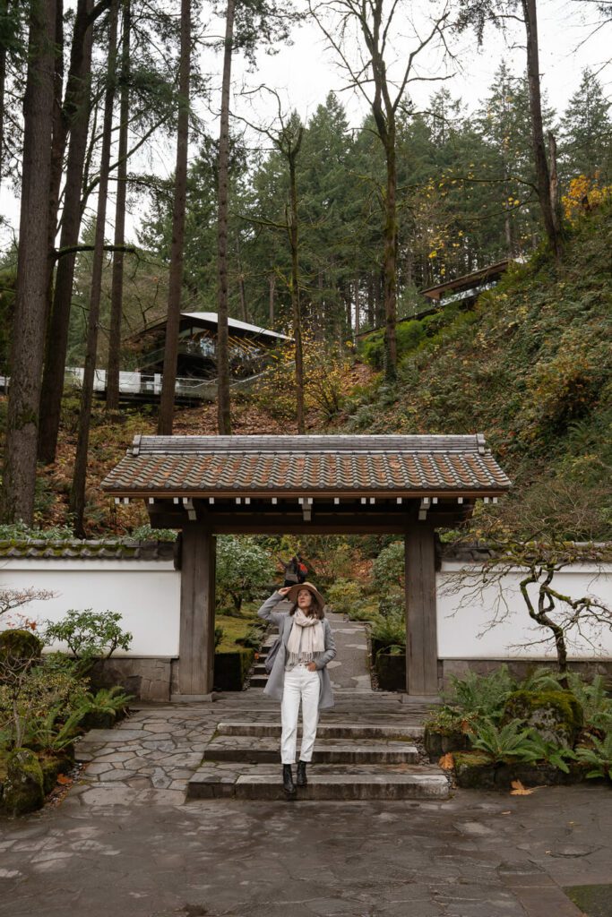 woman at portland japanese garden in winter