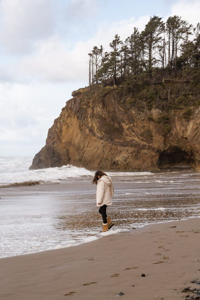 woman at hug point beach