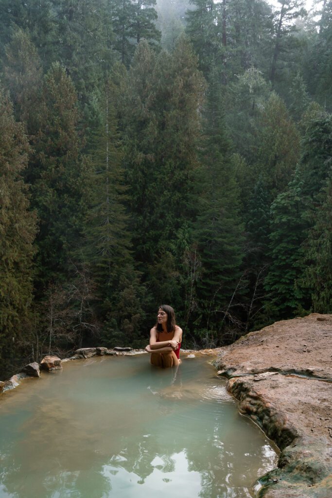 woman at a hot spring in oregon united states