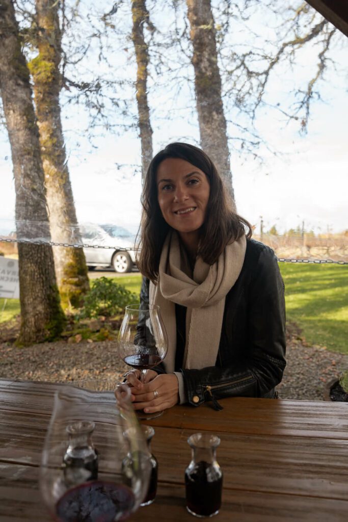 woman (me) at a wine tasting in a willamette winery oregon