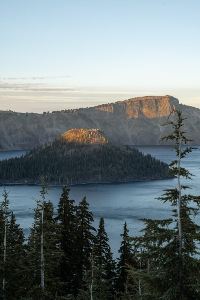 sunset light on wizard island on crater lake