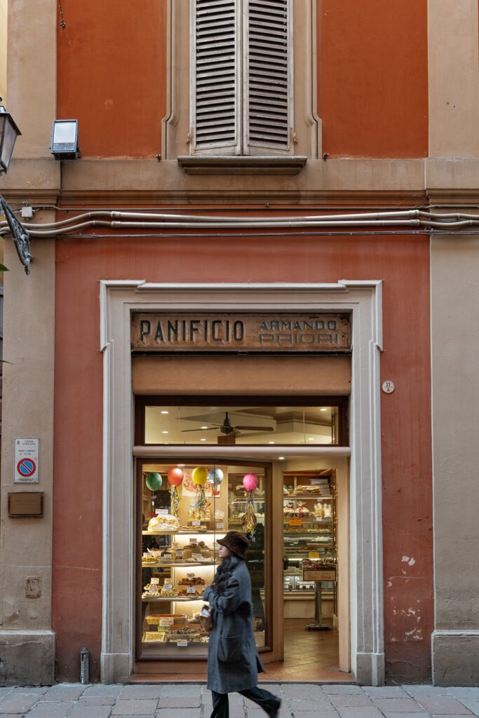 a street with bakery in bologna italy