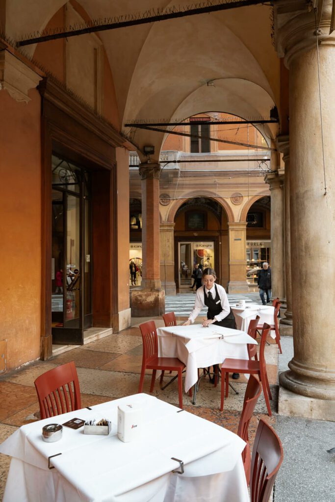 cafe under a portico in bologna italy