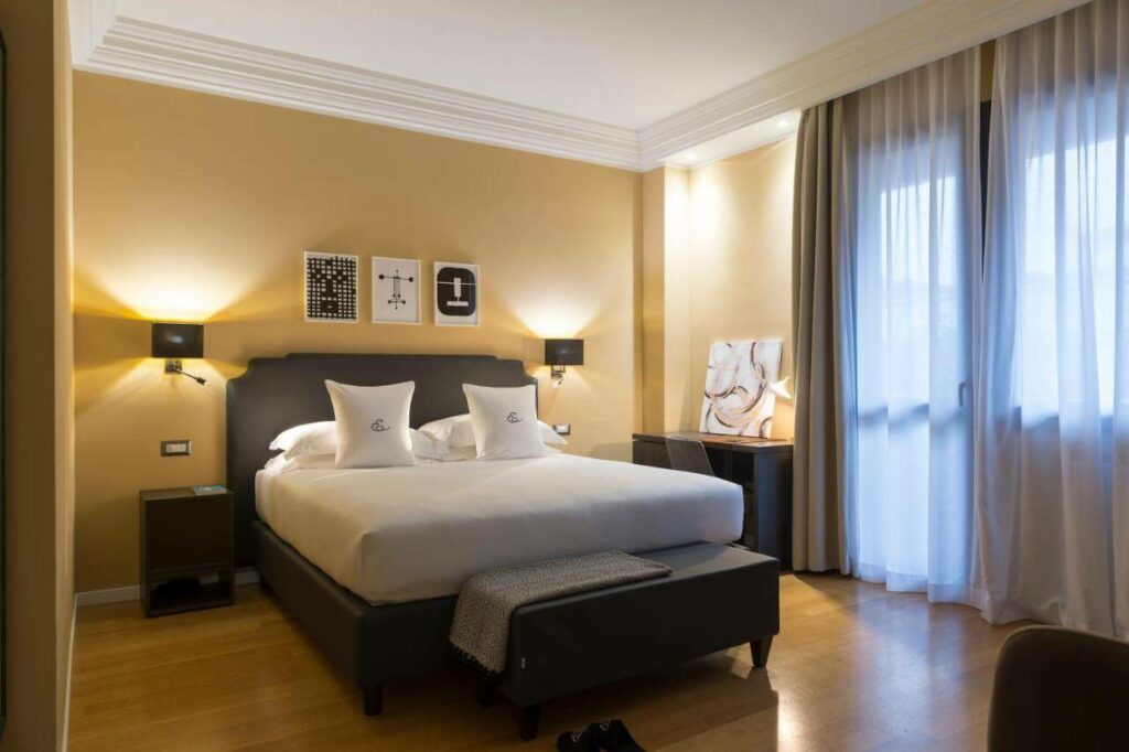 a simple modern hotel room in bologna italy