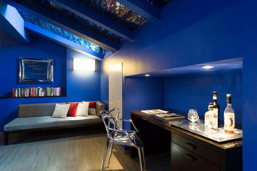 a blue hotel room in bologna italy